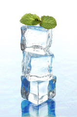 Ice with mint on light background