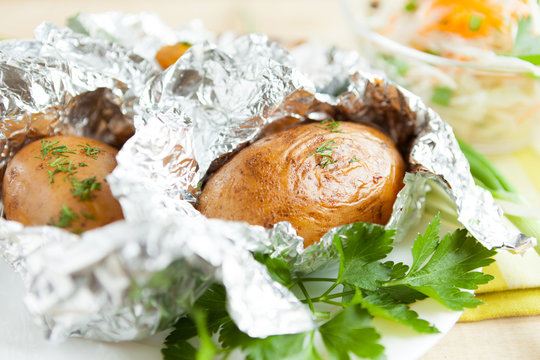 whole potato in foil, and parsley