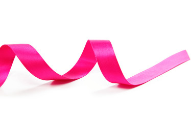 Festive pink ribbon curls on a white background.