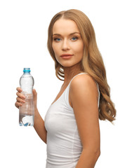 young beautiful woman with  bottle of water