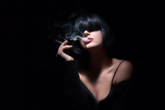 Fashion Art Portrait Of Beautiful Girl Smoking. Sensual Red Lips