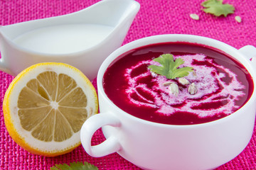 Beetroot cream soup with sunflower seeds and lemon