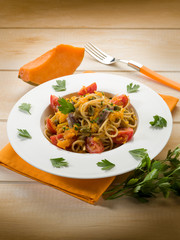 spaghetti with pumpkin anchovy caper and fresh tomatoes
