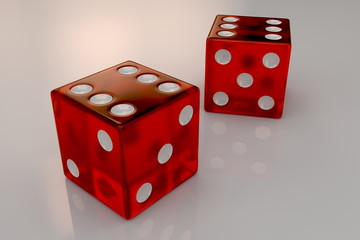 Two glossy red plastic bouncing dices