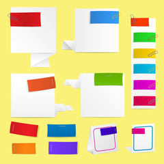 Paper labels with clips and staples