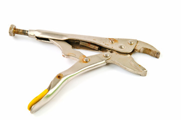 old metal locking pliers on white background