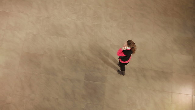 young girl enters the hall