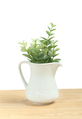 Artificial leafs in small pitcher for home decoration