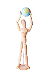 Wooden dummy figure holding earth in hands