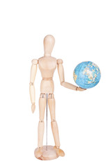 Wooden dummy figure holding earth in hands