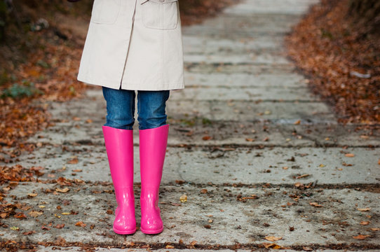 Woman wearing rubber boots