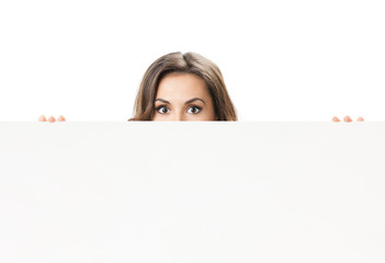 Young woman with blank signboard