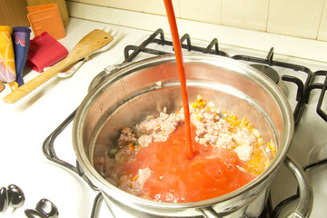 a cooking italian tomato sauce