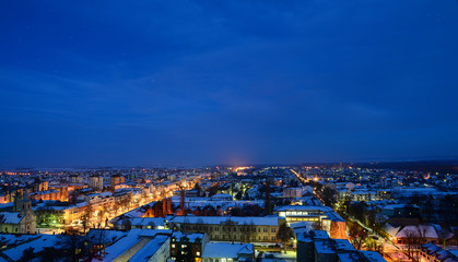 City ​​In Night In The Snow