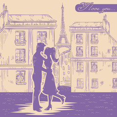 Heureux couple amoureux sur fond de rue de Paris