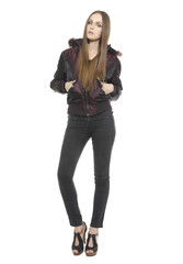 Fototapeta premium Young beautiful stylish woman with jacket isolated
