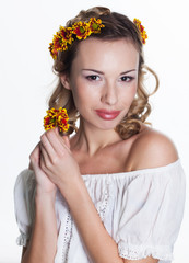 Naklejka premium Girl with chrysanthemum wreath