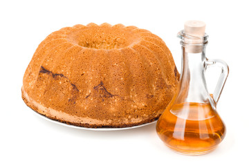 One round cake with a decanter