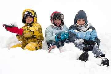 Young kids playing in the snow.