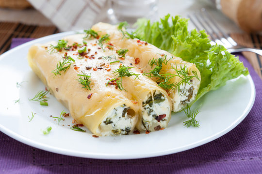 italian cannelloni stuffed with spinach and cheese