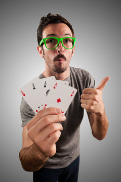 Winner Guy Holding Poker Cards