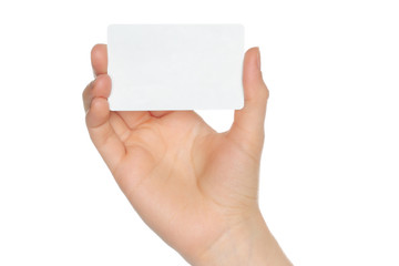 Hand holds charge card on white background.