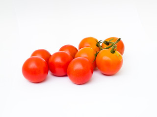 Fototapeta na wymiar Cherry tomatoes isolated on white background