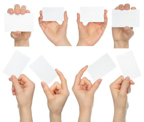 Hands hold business cards collage on white background .