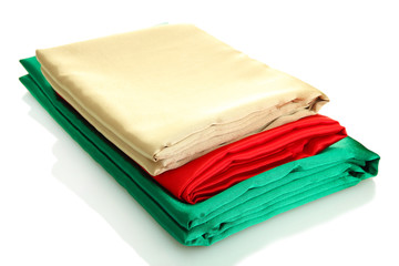 heap of cloth fabrics isolated on white