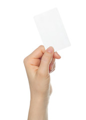 Hand holds charge card on white background .