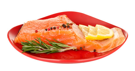 Fresh salmon fillet with herbals and lemon slices