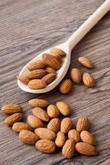 Almonds with a wooden spoon III - 48835176