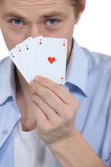 Man with four ACES