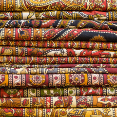 Heap of cloth fabrics at a local market in India.
