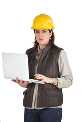Female construction worker using her laptop