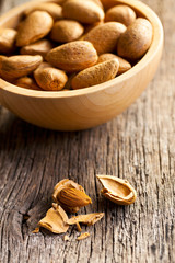 almonds in wooden bowl