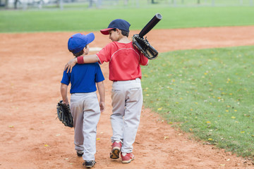 Hispanic boys on baseball field