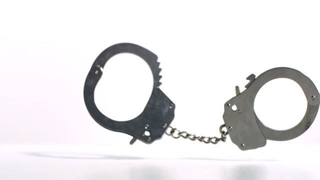 Handcuffs falling and bouncing