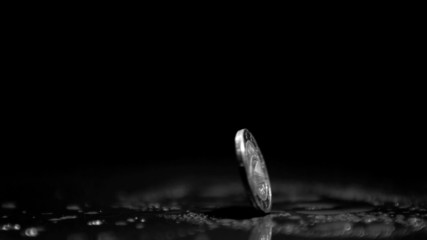 Two euro coin revolving close up - Powered by Adobe