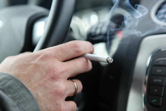 ban smoking in all vehicles