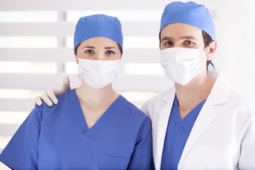Dentist and assistant working as a team