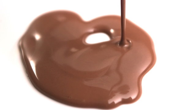 Melted chocolate pouring in slow motion