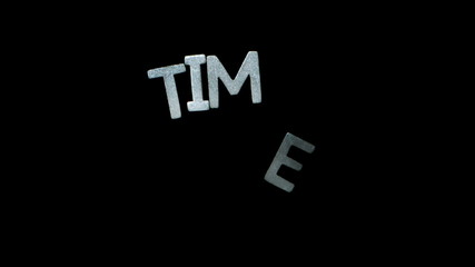 Silver letters spelling out time falling in slow motion - Powered by Adobe