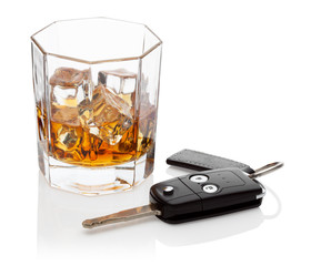 Glass of whiskey and car keys.
