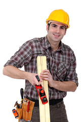 woodworker working with a rasp