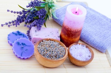 Fototapeta na wymiar dry Lavender herbs, bath salt and candle
