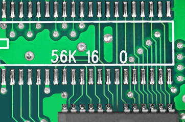 Close up of a printed green computer circuit board