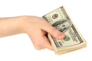 Stack of one hundred dollars banknotes in hand close-up