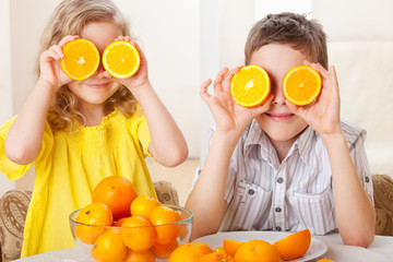Children with oranges