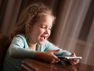 Child playing on tablet